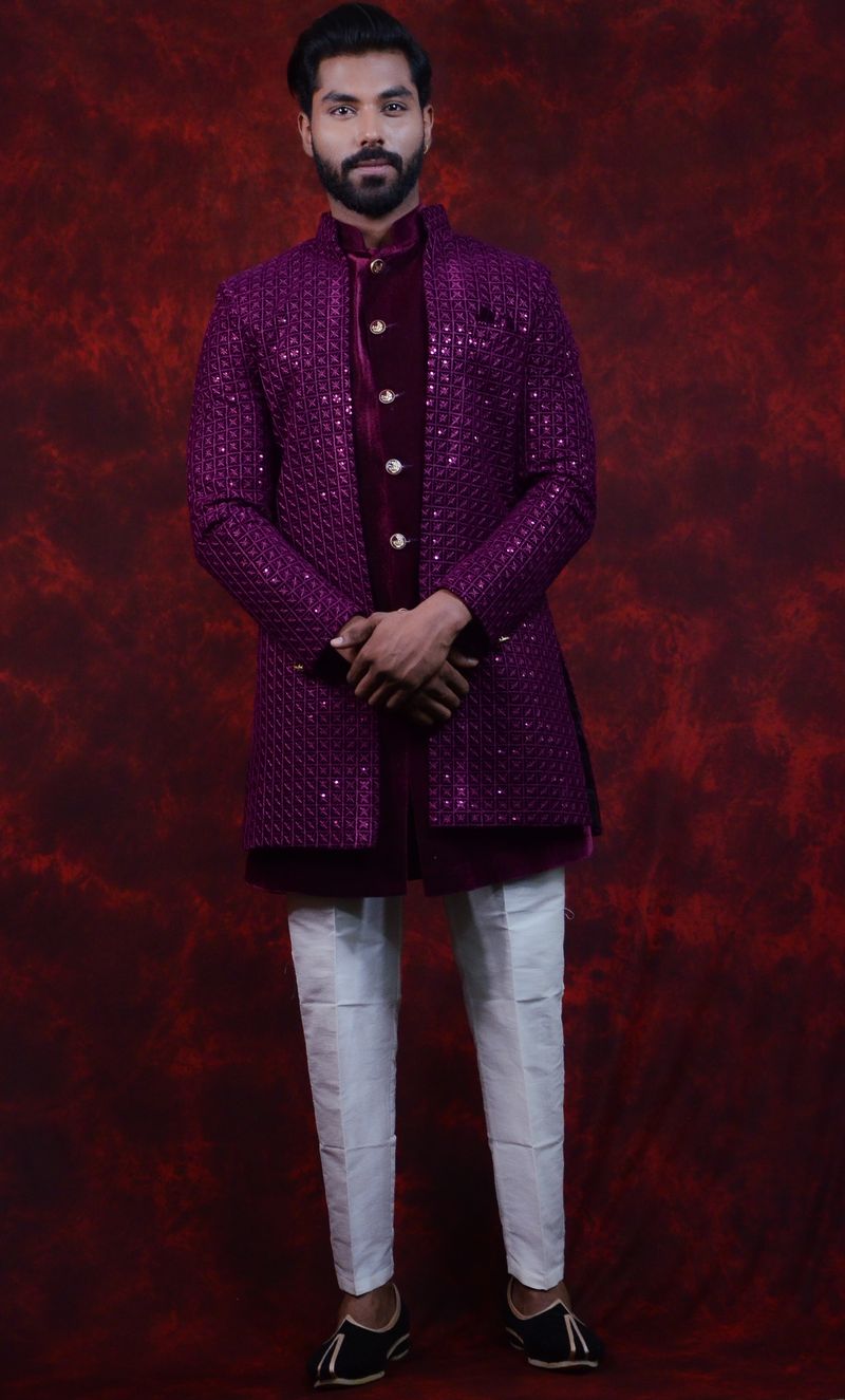 Man in an aubergine embroidered kurta